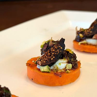 Roasted Yam Coin with fig orange and chevre